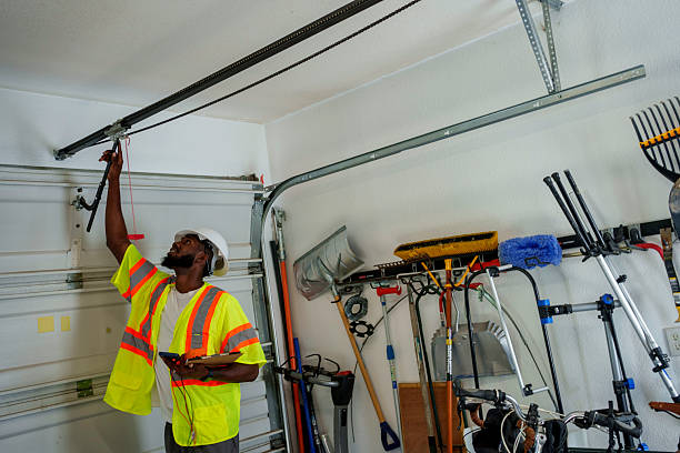 Professional Garage Door technician working in Woodburn, IN